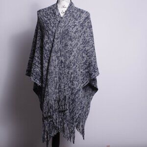 World Markets Women's Marled Knit Poncho Featuring Fringe Tassels.